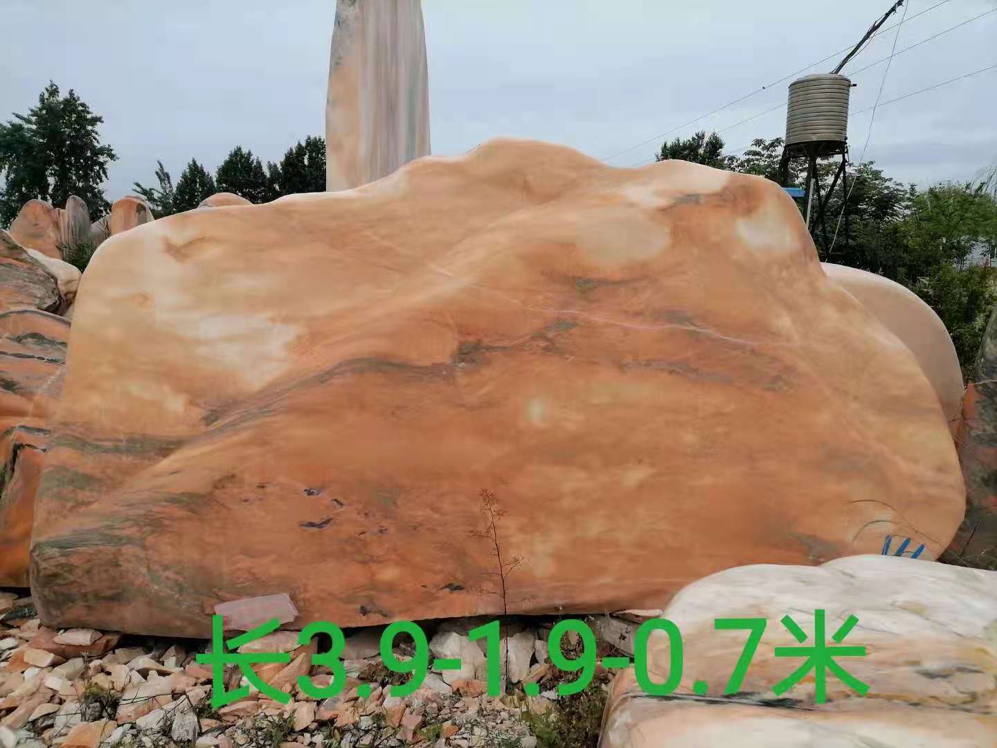 大型晚霞红景观石厂家